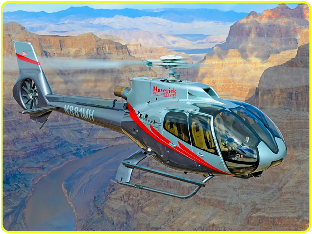 Helicopter tours flying over the Grand Canyon with Colorado River below.