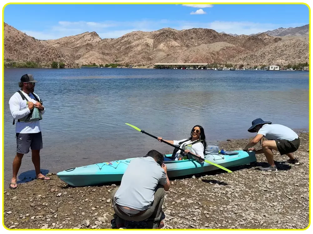 Channel13-Morning-Blend EZ Kayak Tours filming segment with KTNV at Willow Beach, woman getting ready to launch guided kayak tour